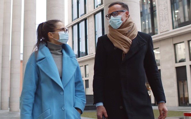 Business Colleagues Wearing Protective Masks Talking Meeting In City