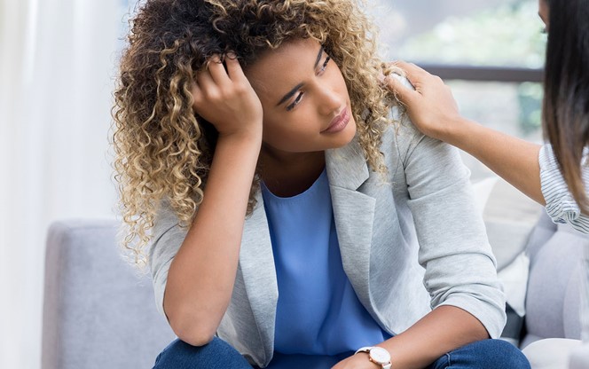 Depressed Woman Talks To Therapist