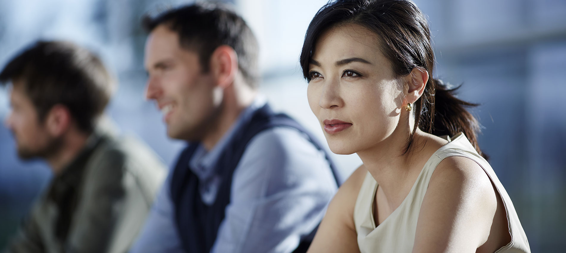 Business People Sitting In Meeting
