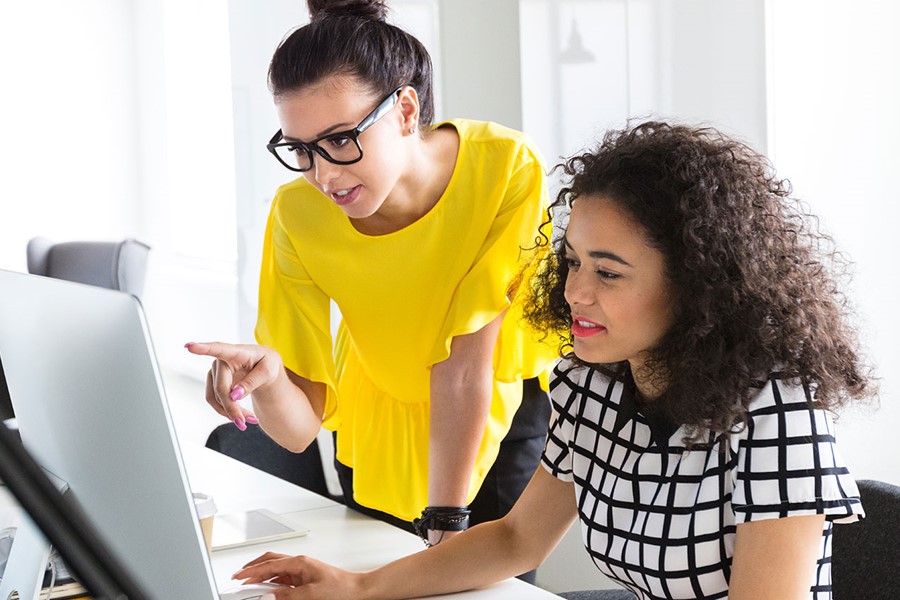 Creative Professionals Working Together On Computer