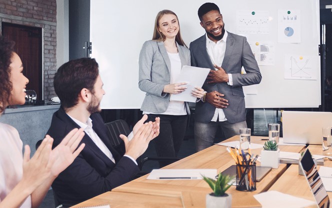 How to Run Effective Meetings Boss welcoming new employee and representing to colleagues