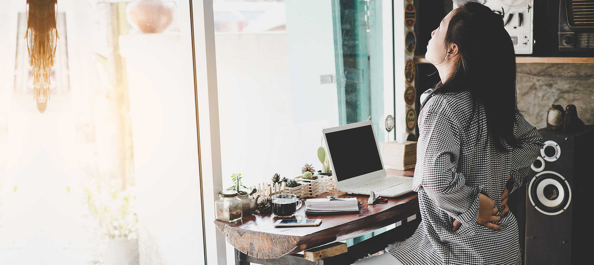 Businesswoman Suffering From Pain Of Lower Back