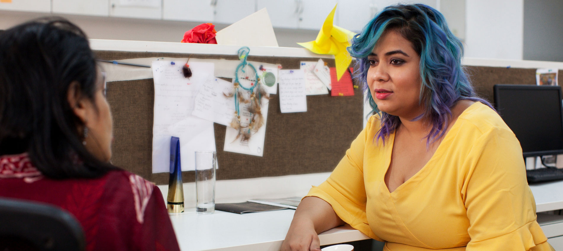 two employees in discussion