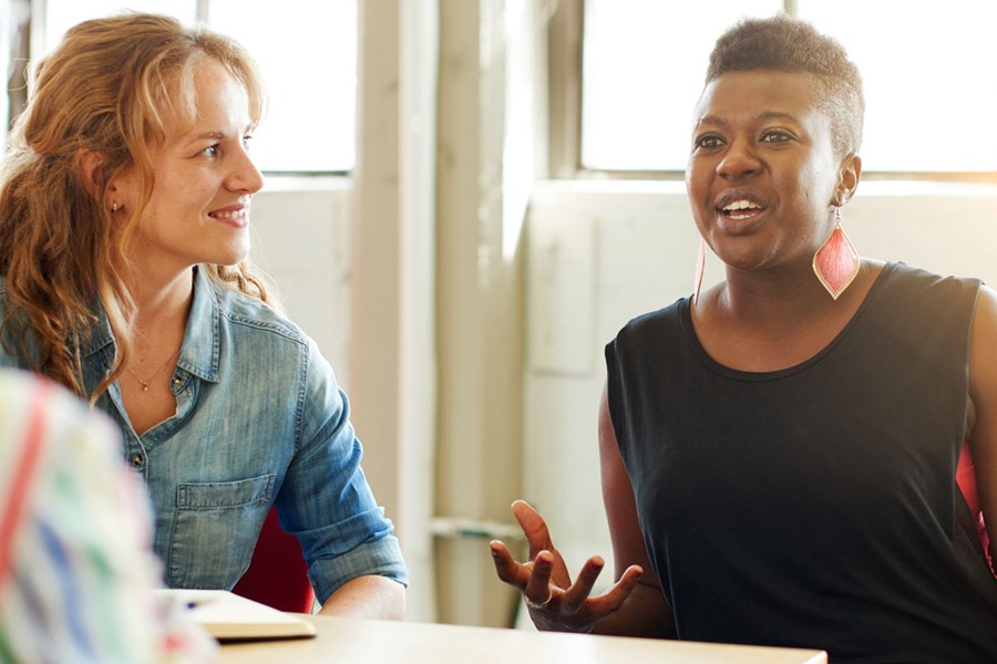 Unposed Group Of Creative Business People In An Open Concept