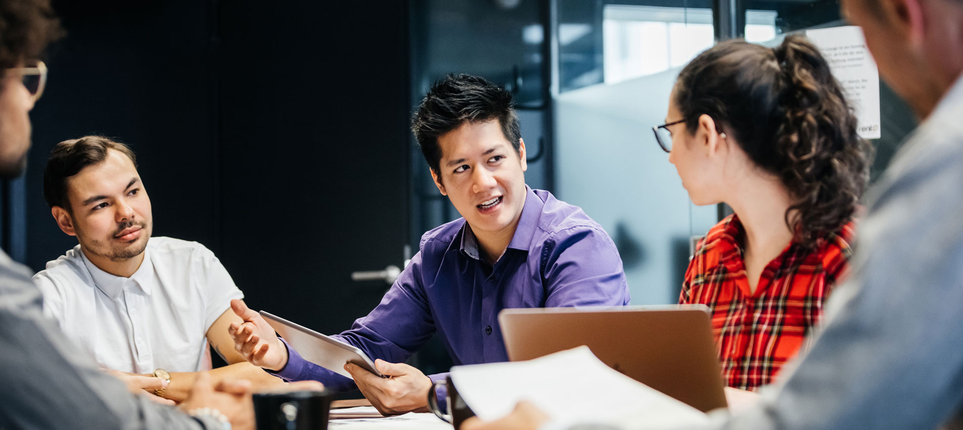 Managers Holding A Weekly Meeting To Discuss The Direction Of Their Business