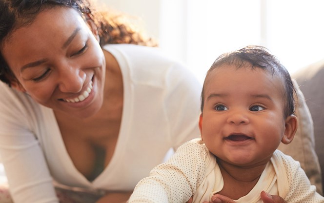 Young Black Mother Spending Time With Her Baby