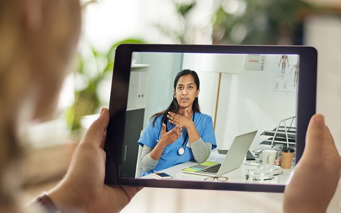Doctor Talking To Patient Via Telehealth Communication