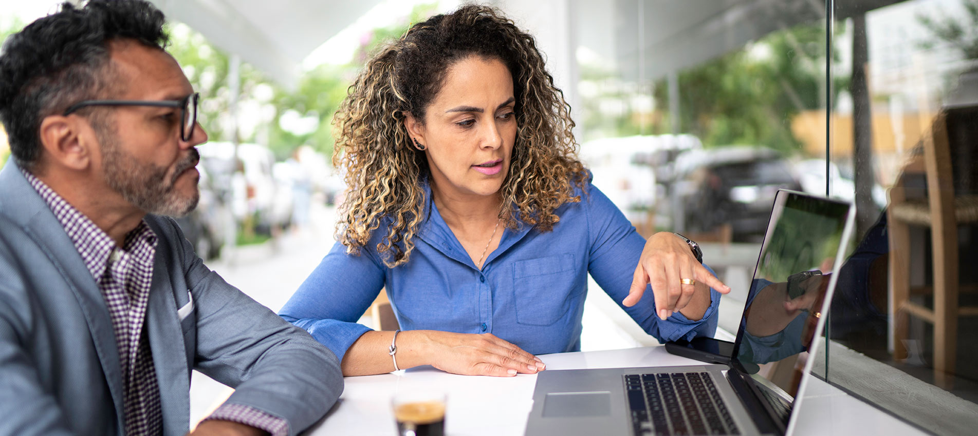 Colleagues Working In A Cafeteria