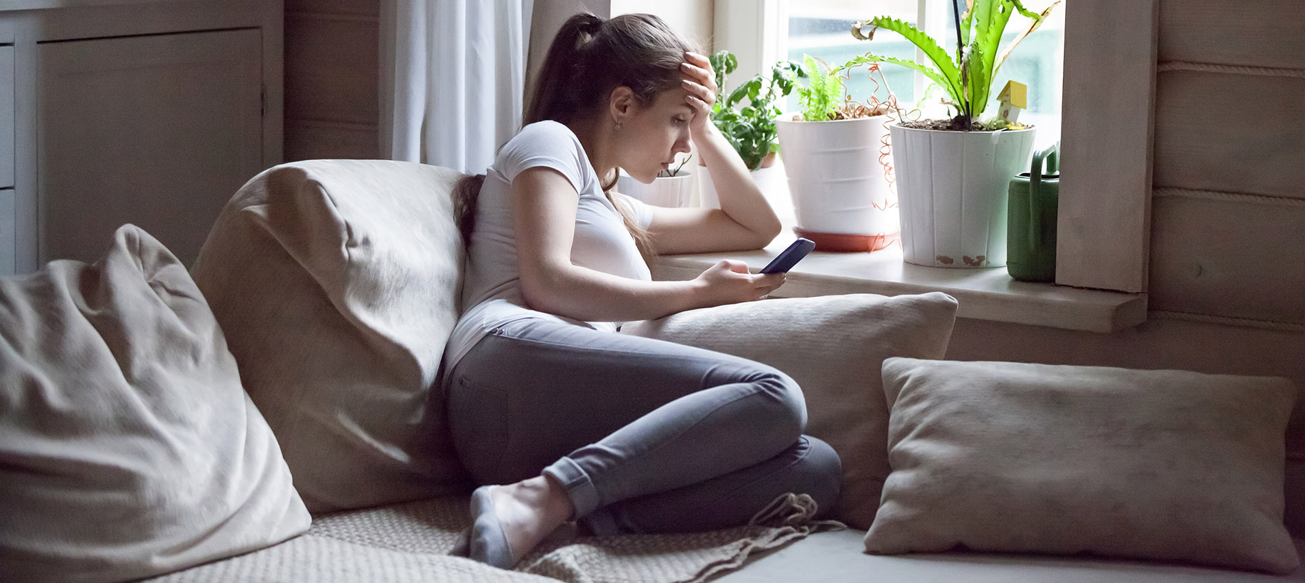 Woman Upset Reading Bad Message At Home