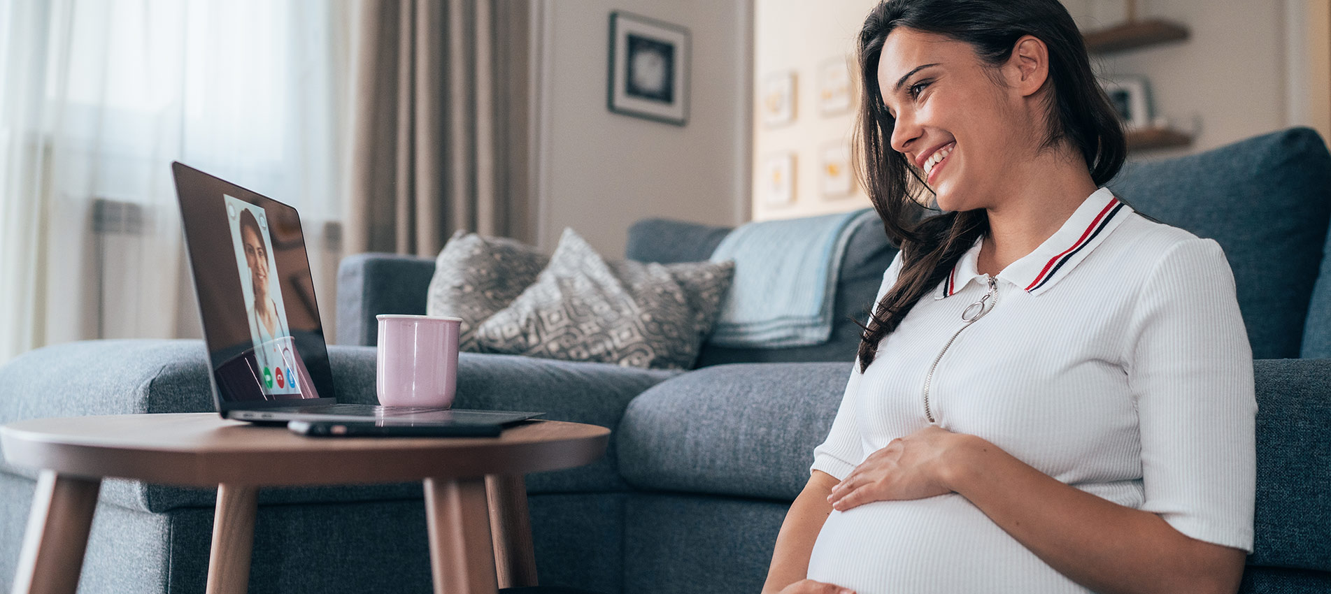Pregnant Woman Having Video Call With Doctor