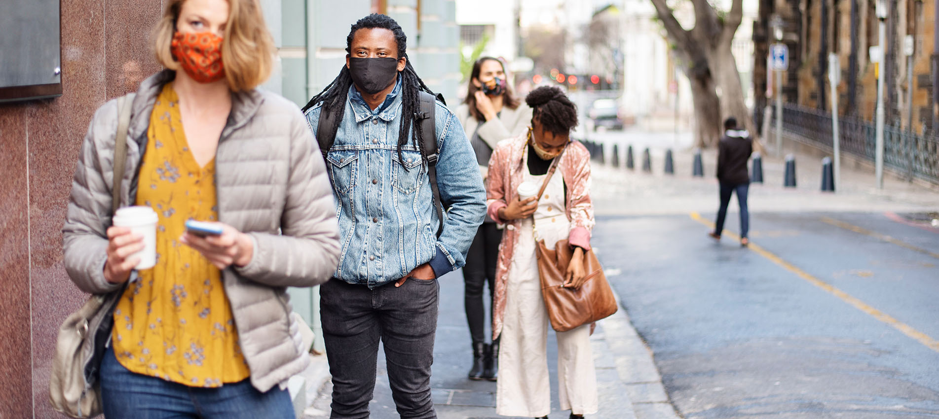 People In Face Masks Shocial Distancing