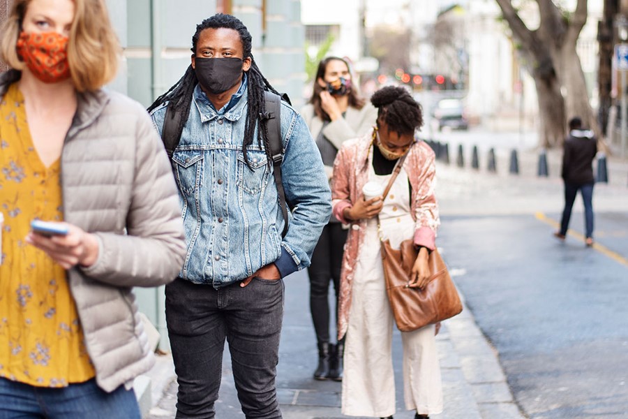 People In Face Masks Shocial Distancing