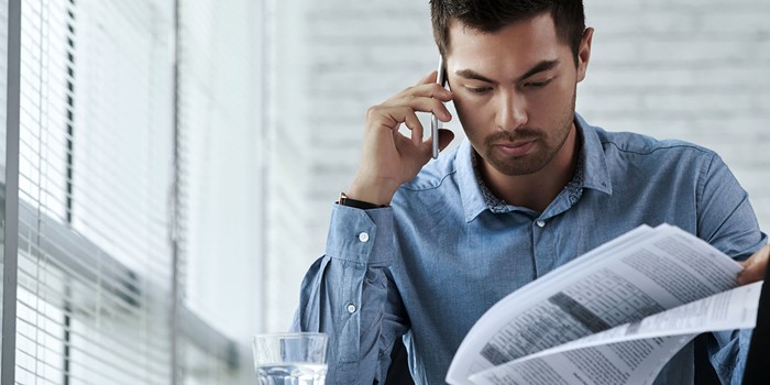 Man Reviewing Document