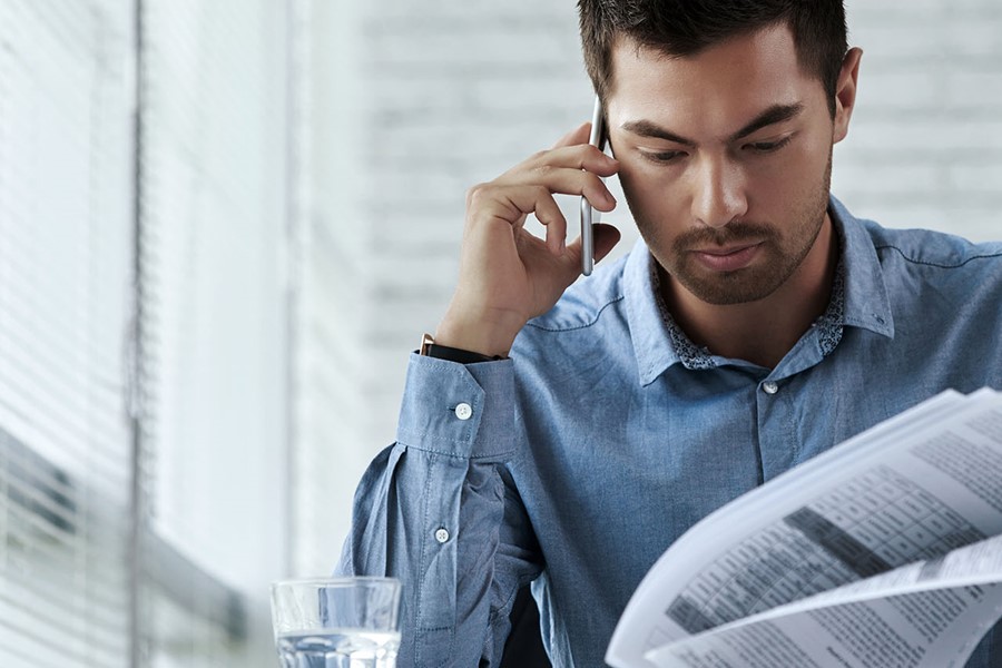 Man Reviewing Document