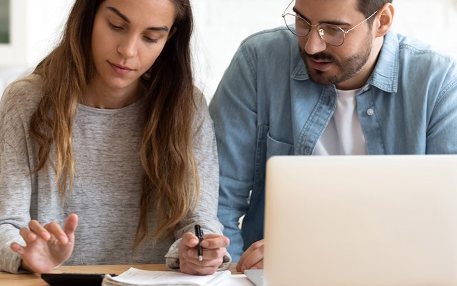 Couple Calculating Finances