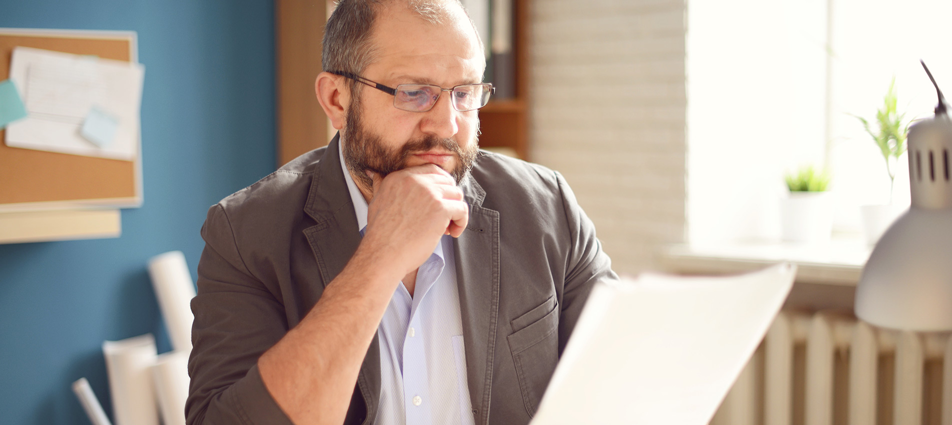 Mature Adult Man Working In The Office