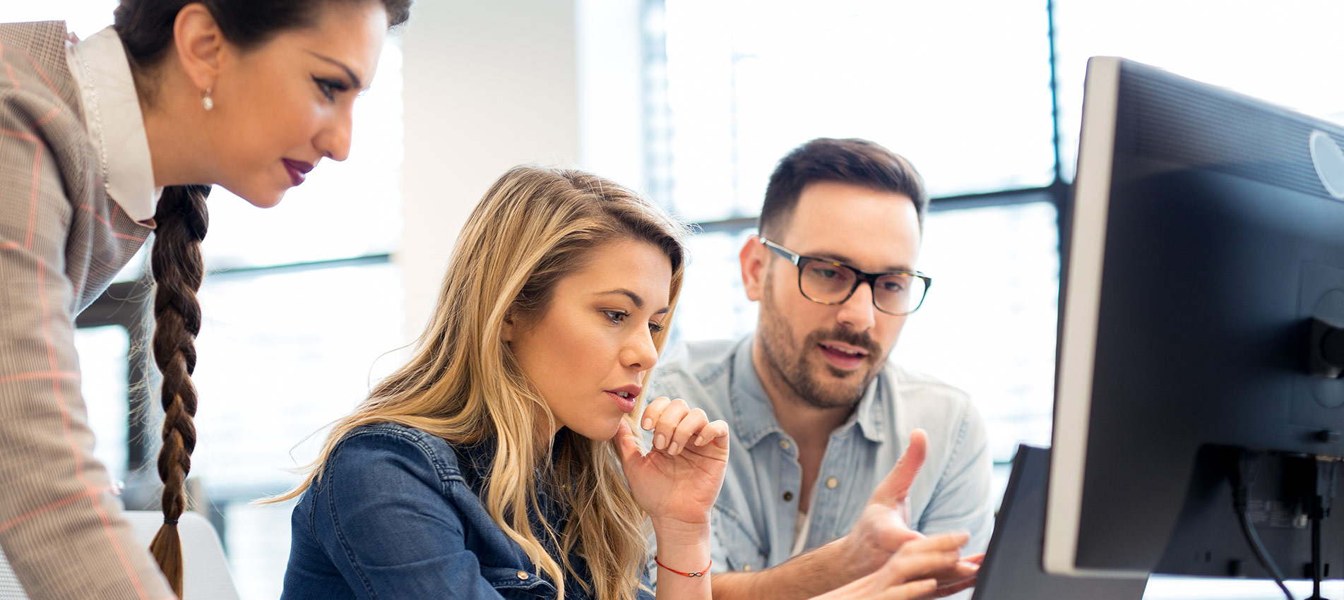 Group Of Business People And Software Developers Working As A Team In Office
