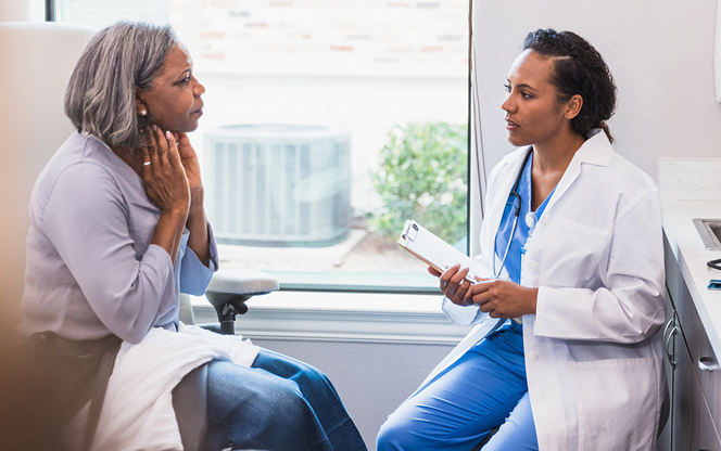 Senior Woman Discusses Swollen Lymph Nodes With Doctor