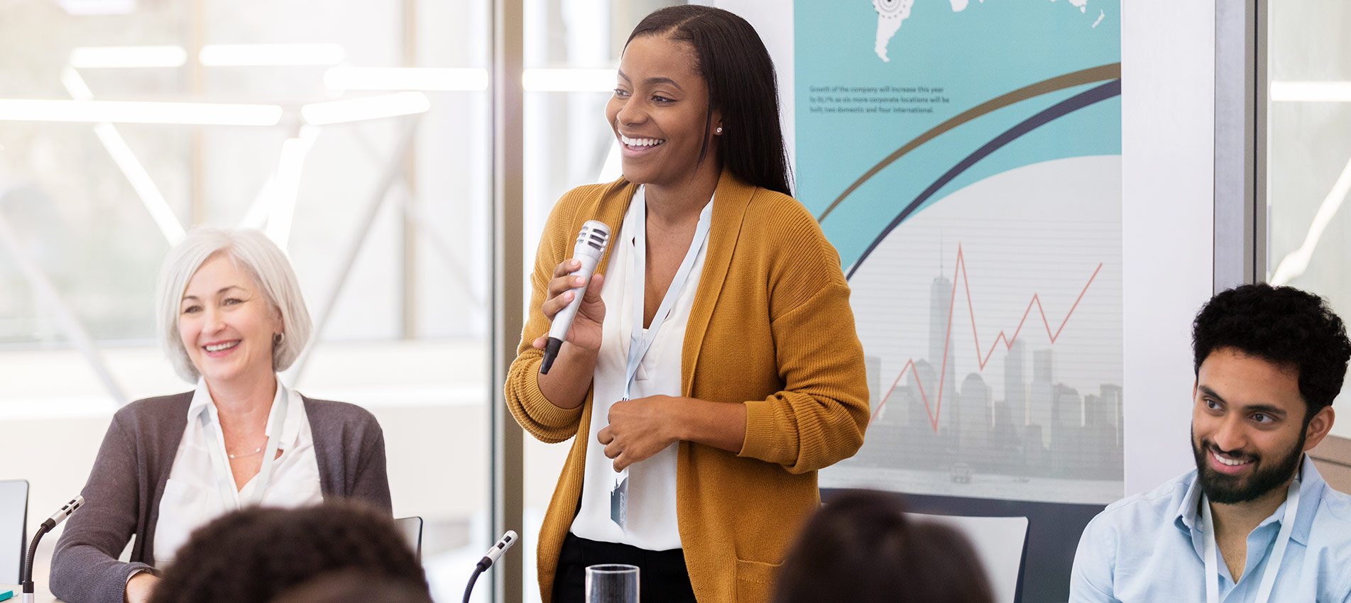 African American Businesswoman Facilitates Panel Discussion