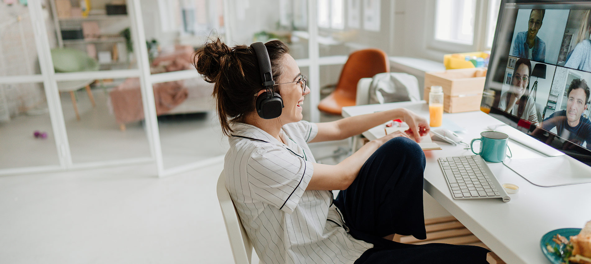 Smiling Woman Having A Video Call With Her Friends