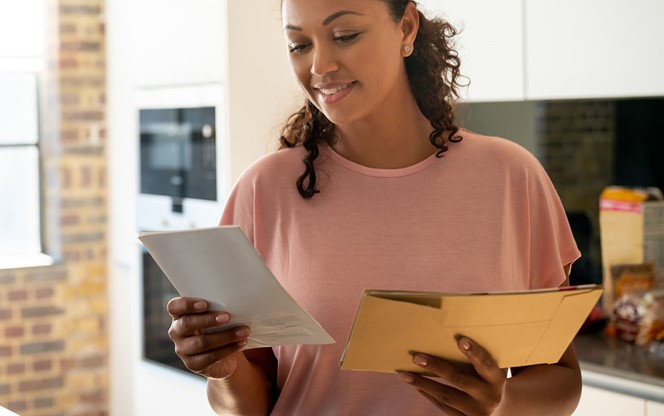 Woman Reading Her Mail