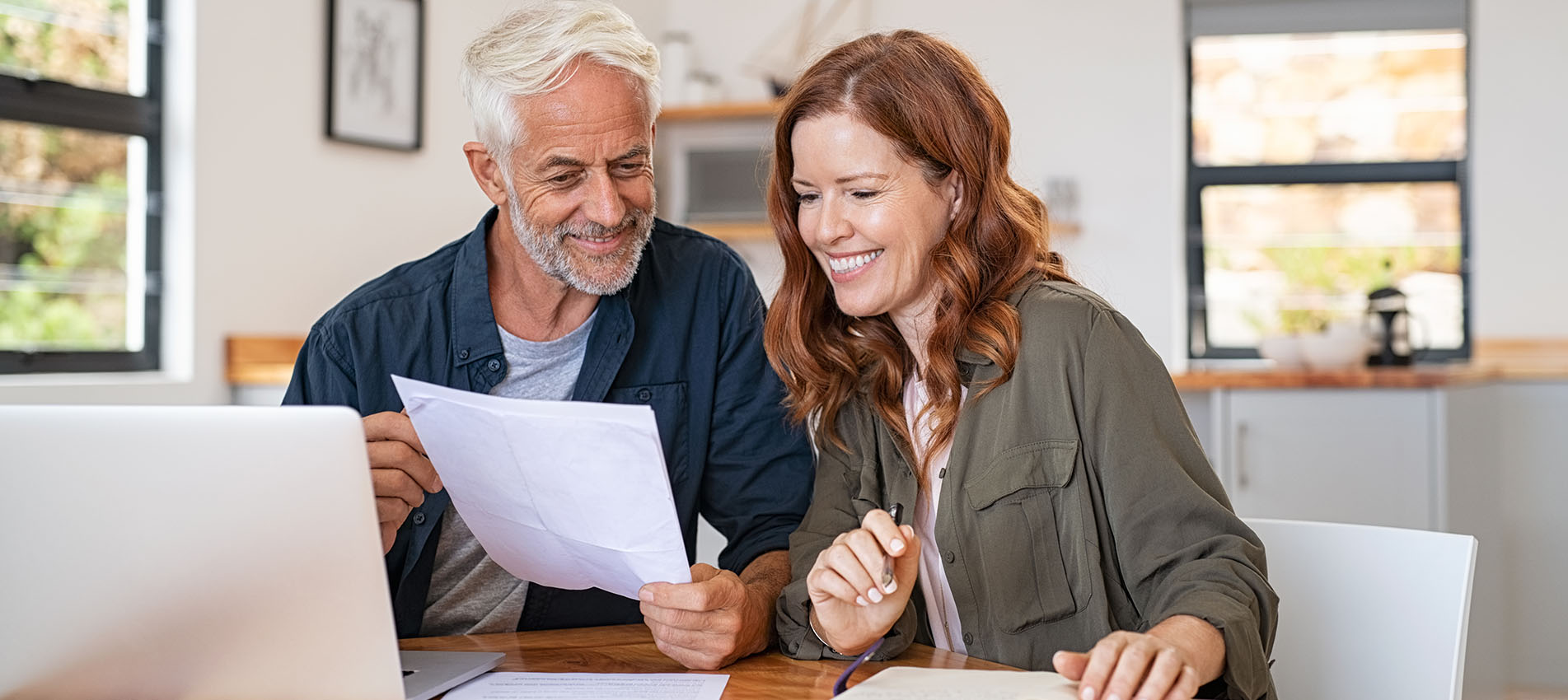 Couple Reviewing Document