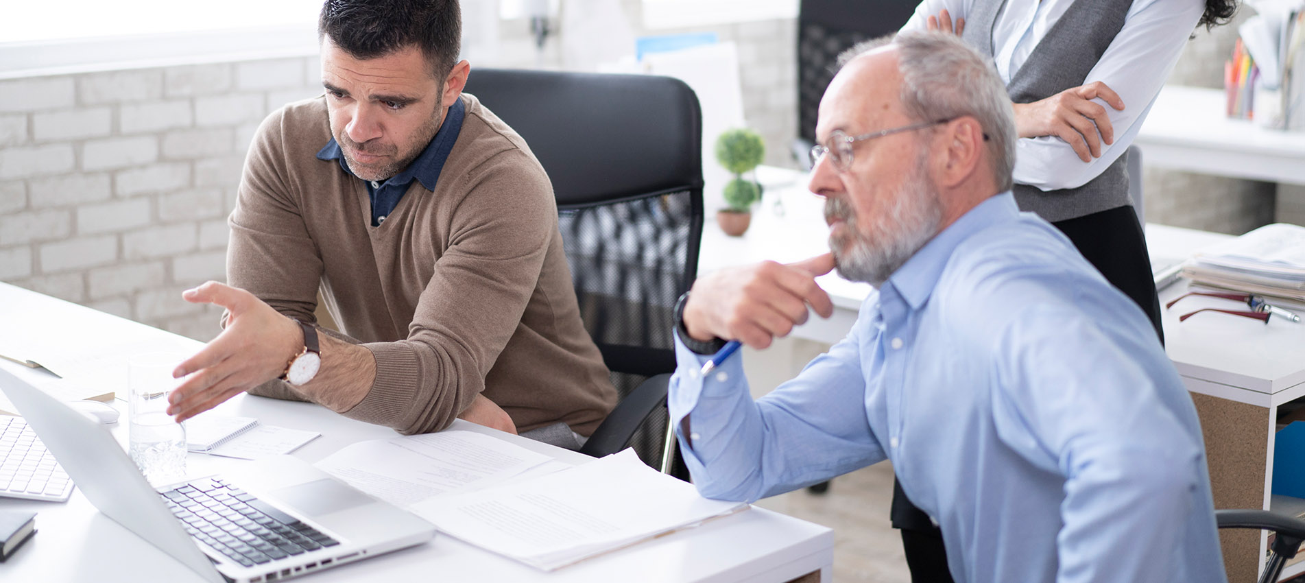 Coworkers Discussing A Project