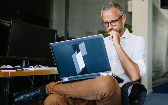 Businessman Busy Working On Laptop