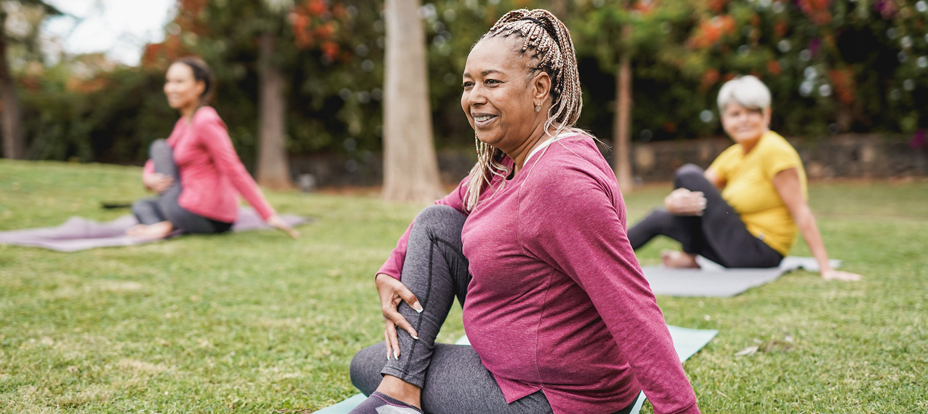Multiracial Women Doing Yoga Exercise With Social Distance For Coronavirus Outbreak At Park Outdoor