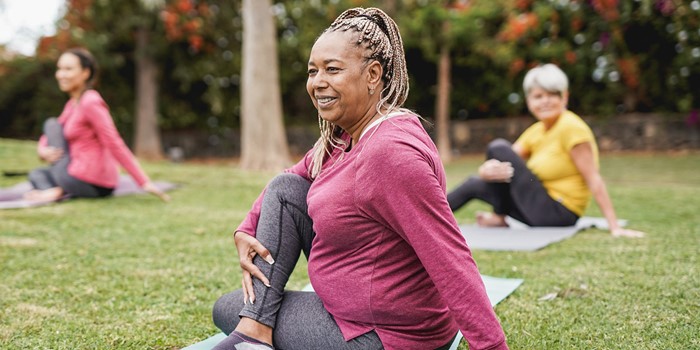 Multiracial Women Doing Yoga Exercise With Social Distance For Coronavirus Outbreak At Park Outdoor