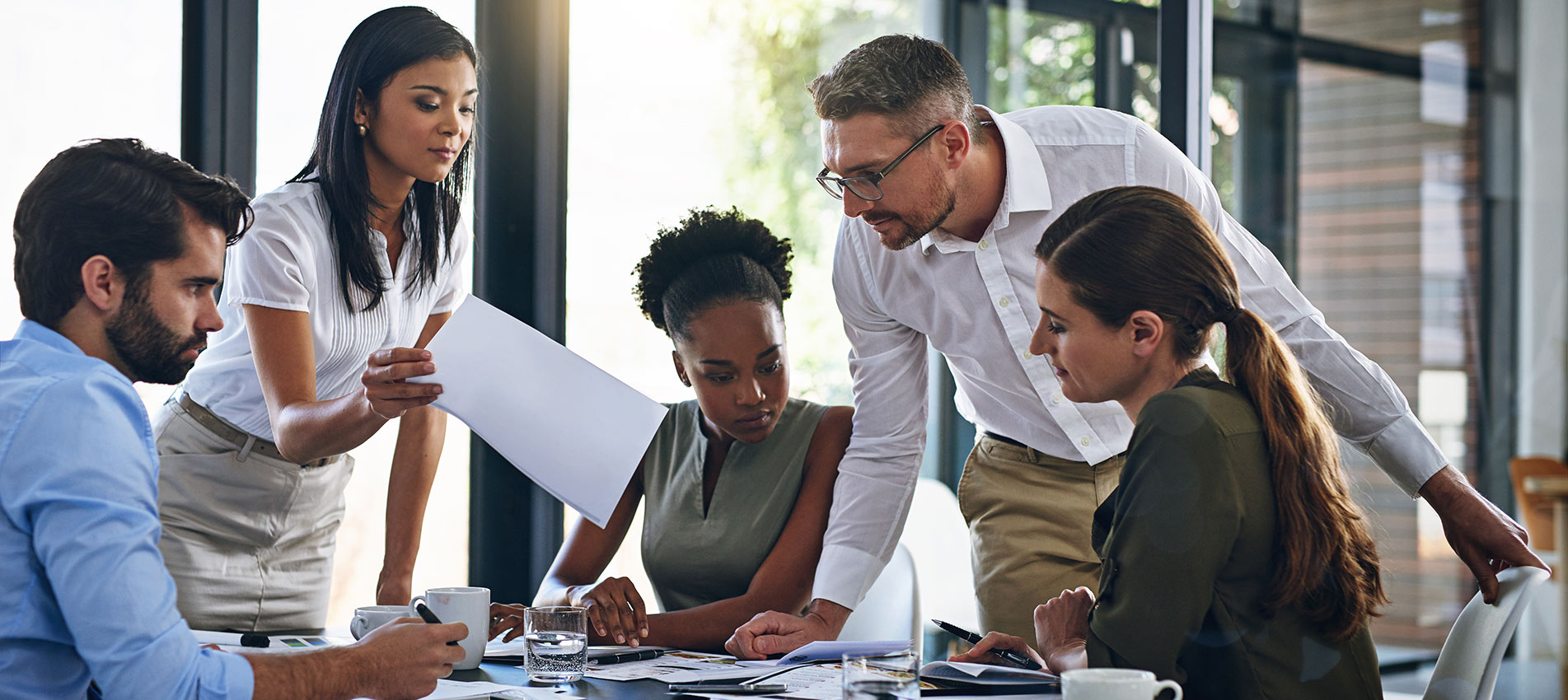 Group Of Businesspeople Having A Meeting In A Boardroom