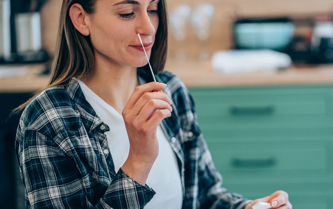 Woman Doing A Self Test For Covid