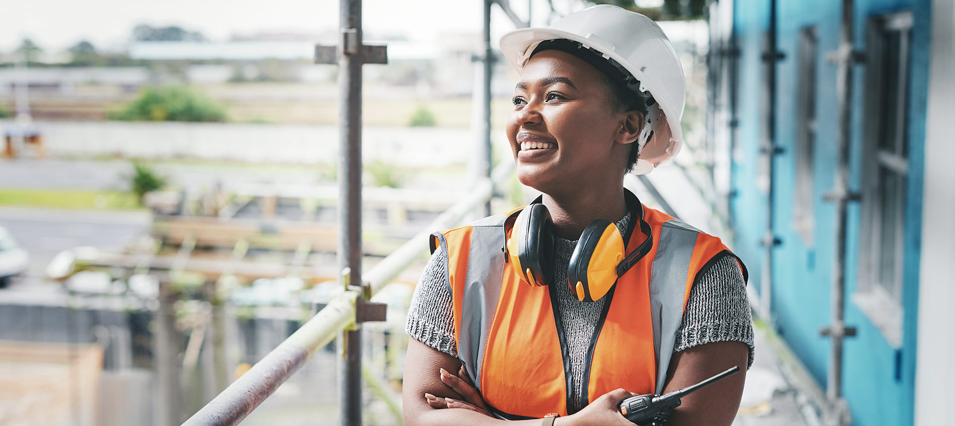 Young Woman Working At A Construction Site