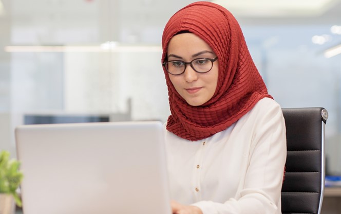 Young Muslim Hijab Business Woman In Office
