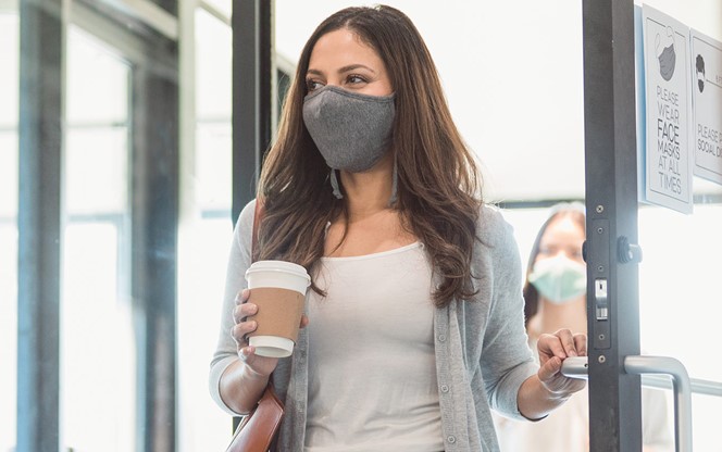 Businesswomen Return To Office During COVID 19 Pandemic