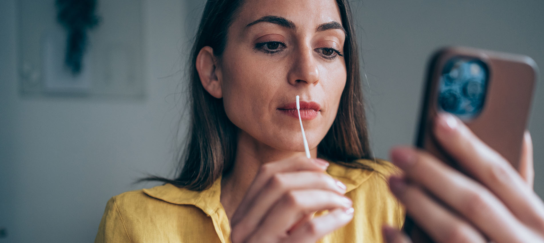 Woman Taking Nasal Swab Covid Test