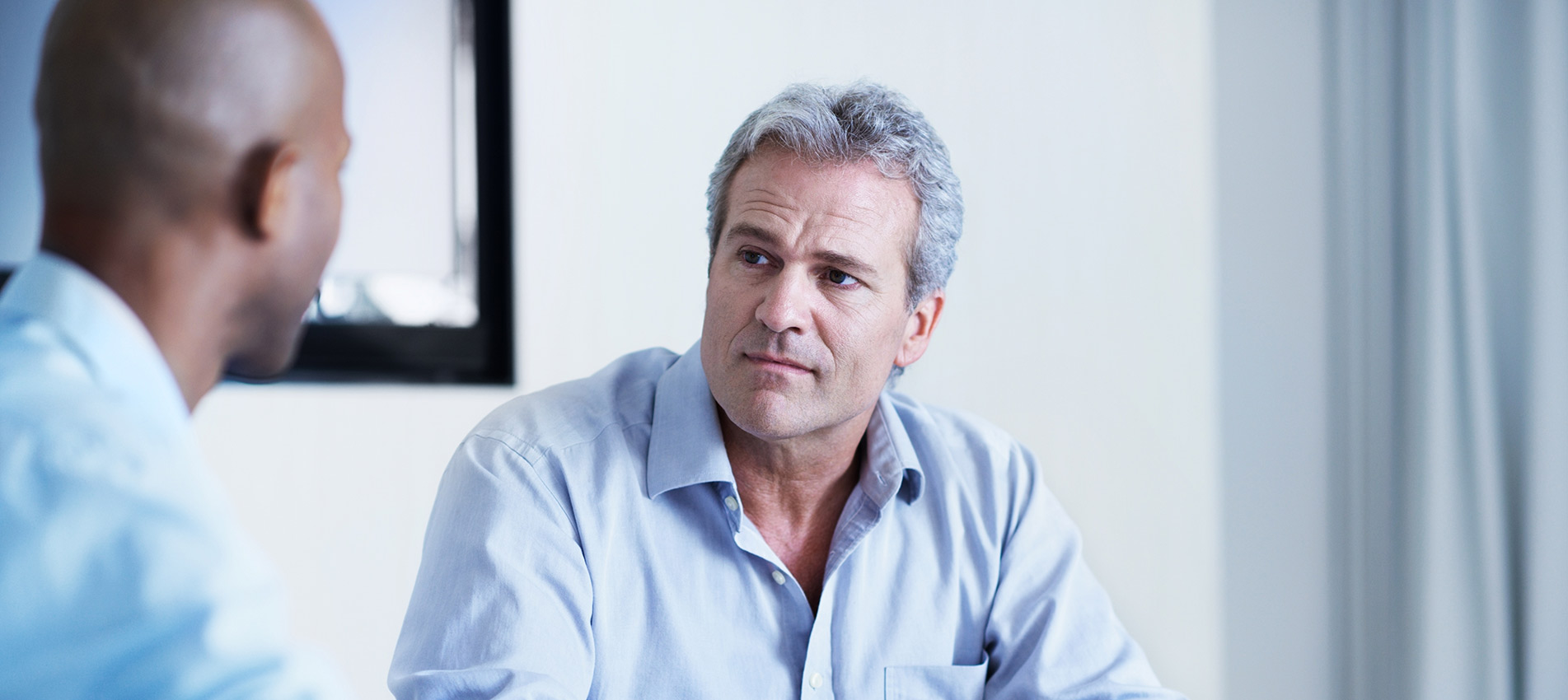 Two Coworkers Discussing Work