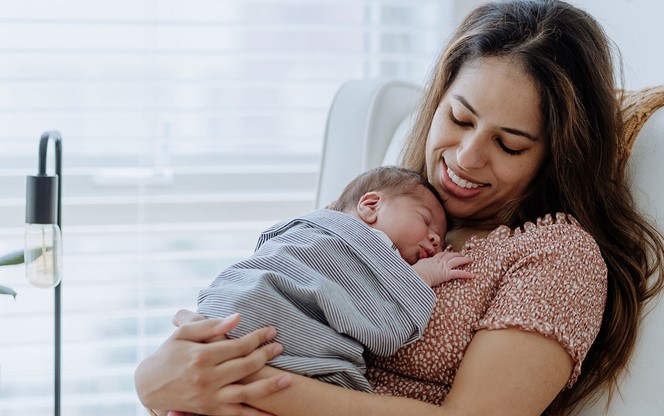 Mother Holding Her Baby