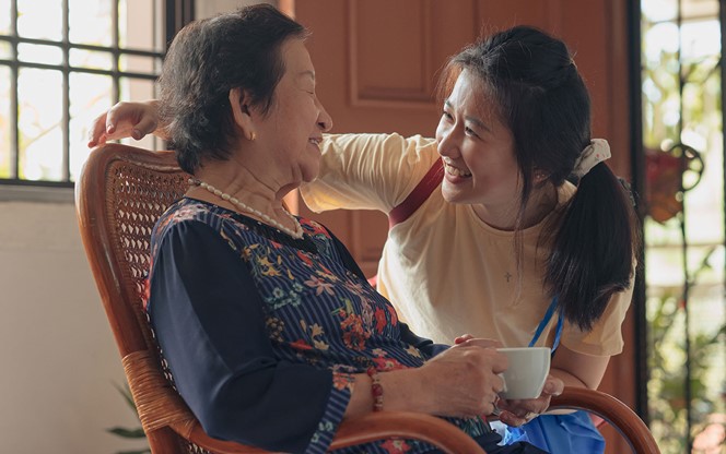 Asian Granddaughter Visiting Her Grandmother
