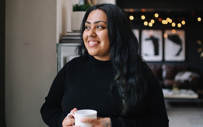 Young Woman Having Coffee
