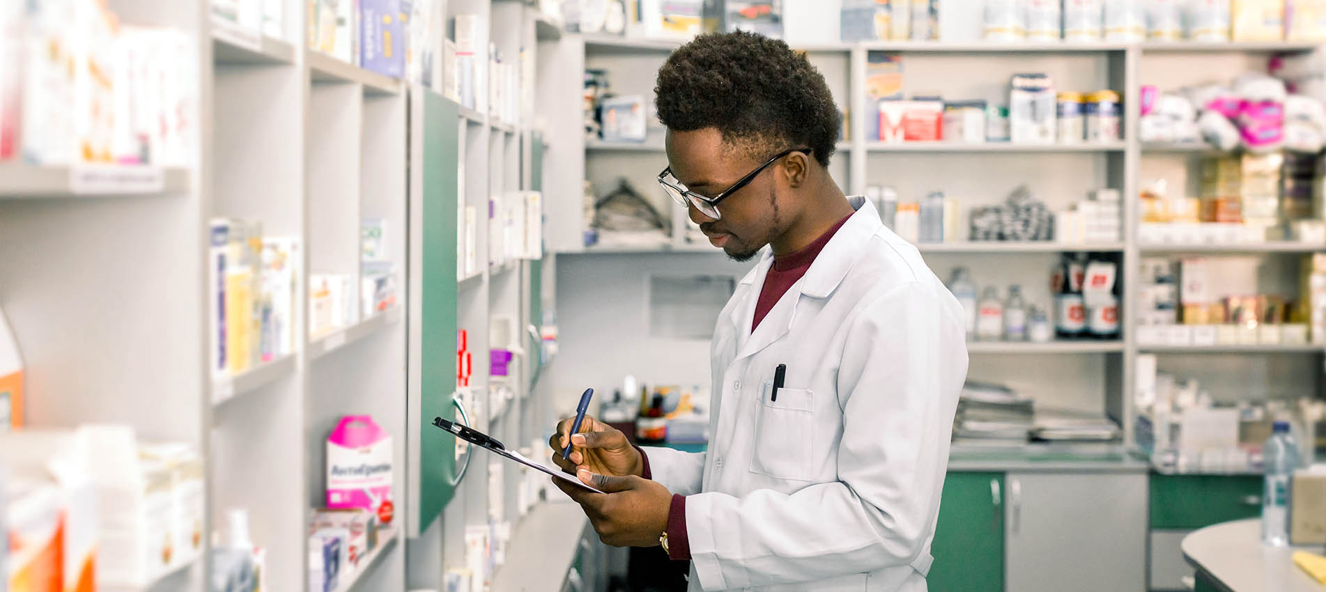 Pharmacist Taking Inventory