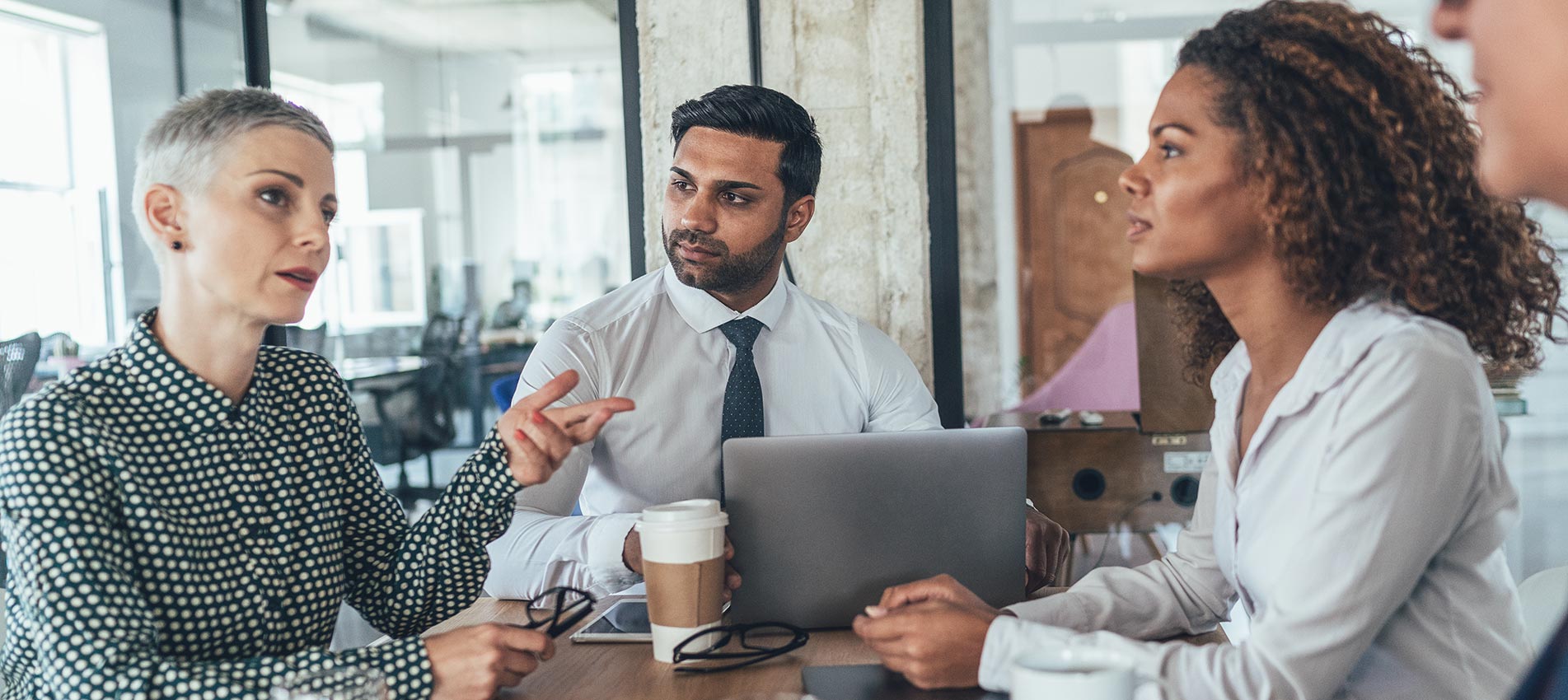 Business People Having Discussion During Business Meeting At The Office