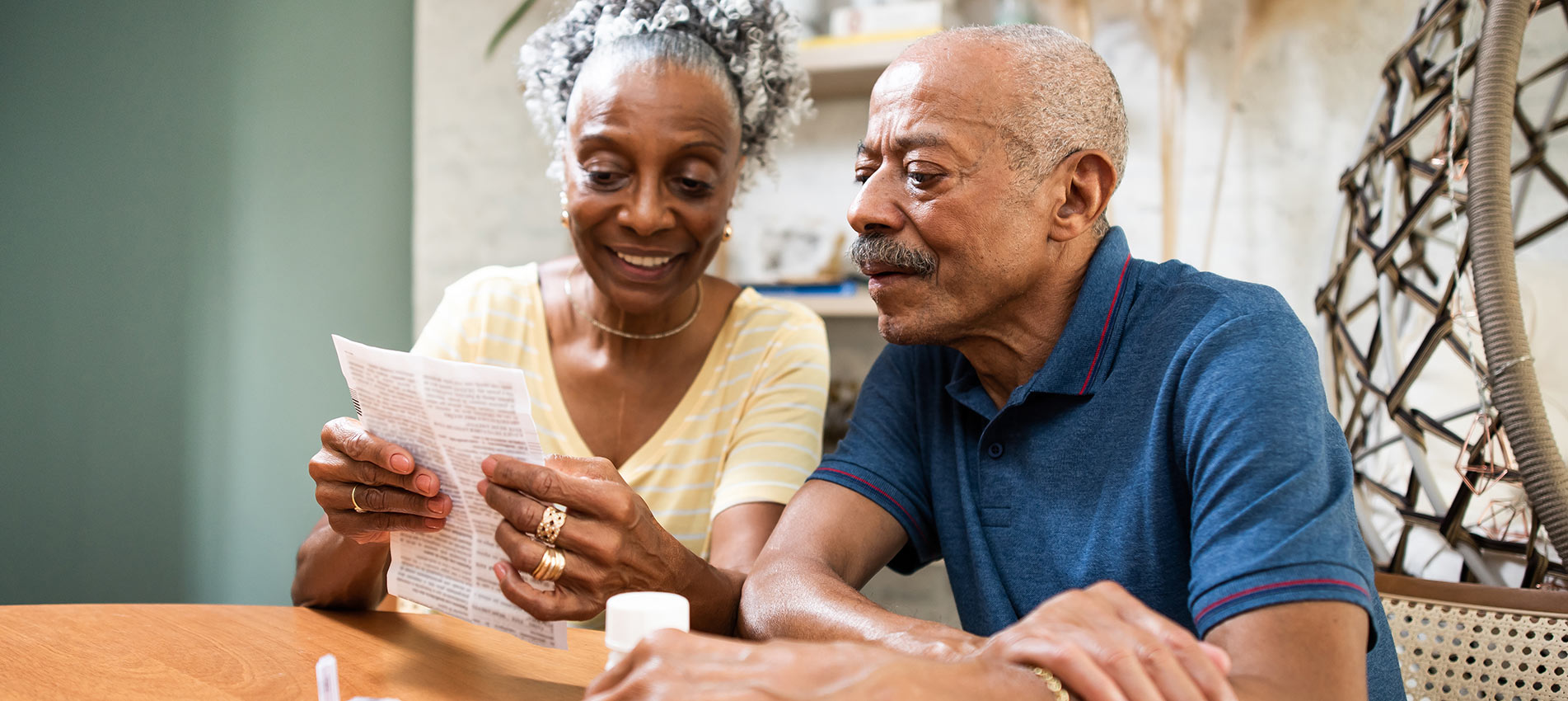 Senior Adult Taking Medication At Home