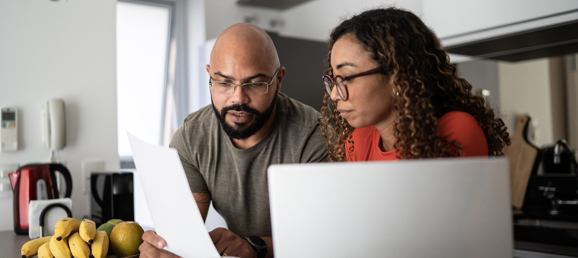 Couple Doing Home Finances Together At Home