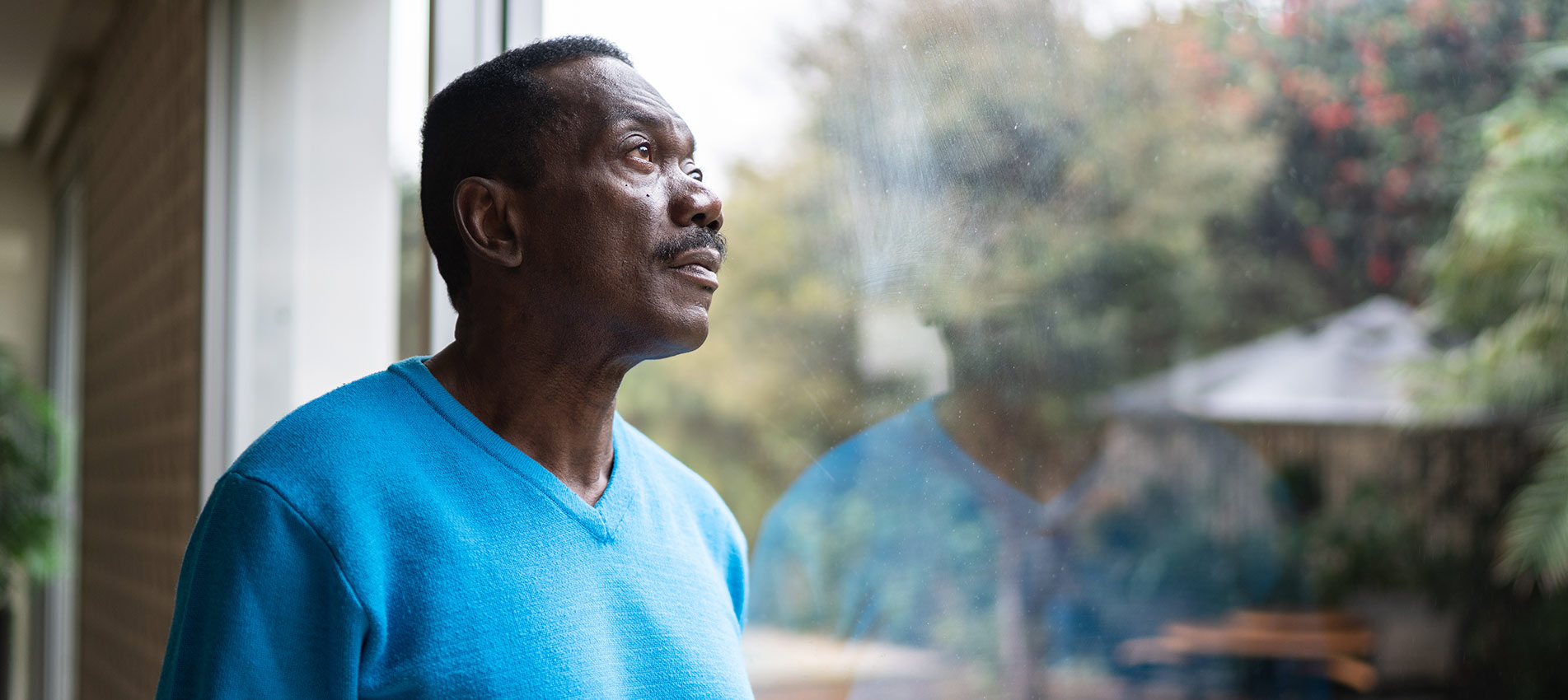 Senior Man Contemplating At Home