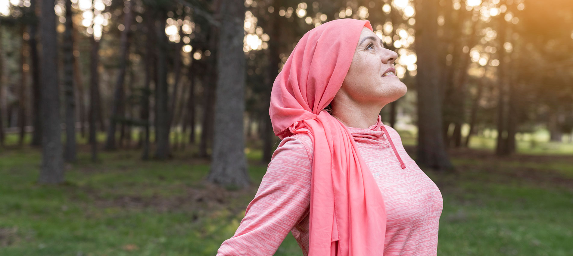 Caucasian Mature Woman Wearing Pink Cancer Scarf Screaming Proud