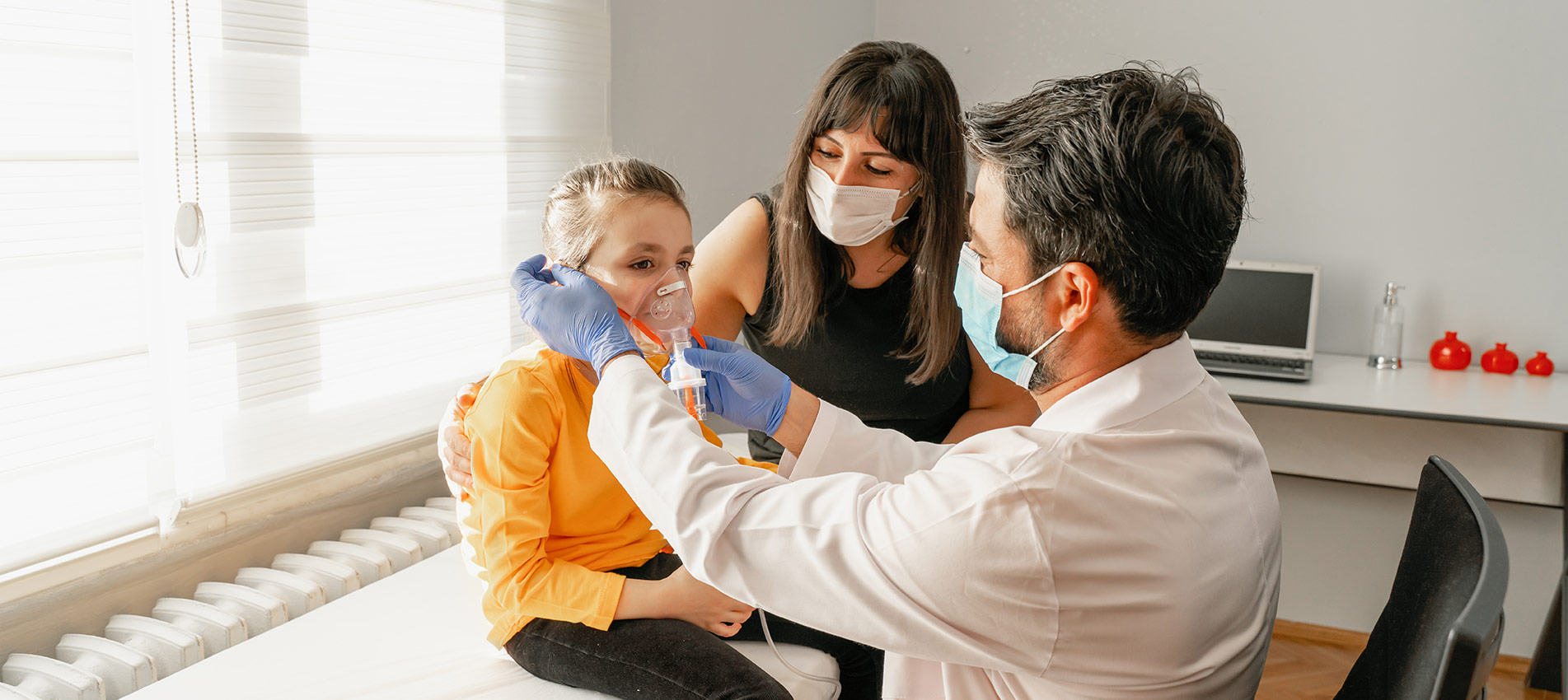Pediatrician Having A Check Up On His Patient