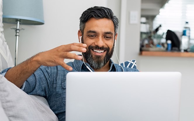 Man Using Laptop For Video Call