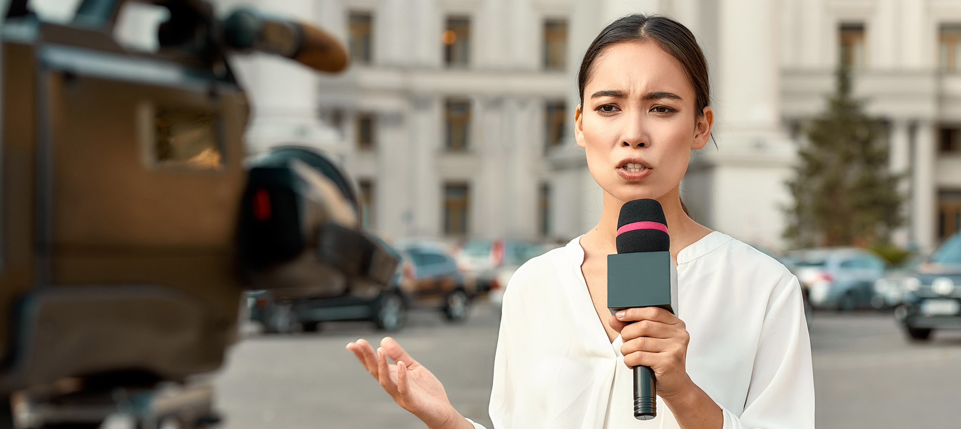 TV Reporter Presenting The News Outdoors