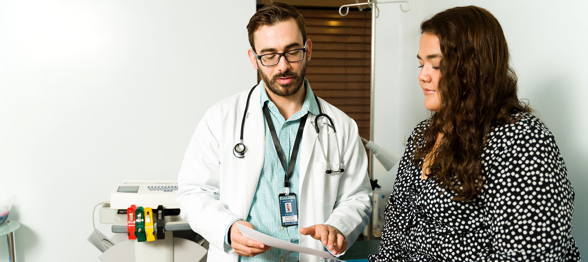 Doctor Giving Prescription To Woman